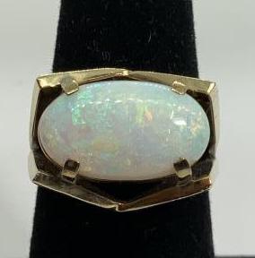 Opal Cabochon Gold Filled Ring, 18k: Fits size 7, marked on interior band 18k, no following hallmark but believed to be gold filled. opal cabochin with geometric / architectural face details, some discoloration and wear to ring band. Lad