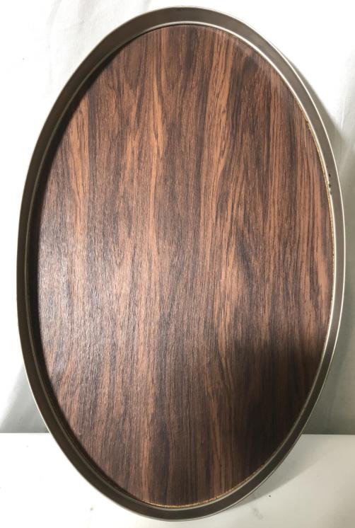 Lot 2 Vintage Serving Trays, Trade Continental: Vtg Trade Continental Mark, Hand Wrought 619, Aluminum Handle Serving Tray Platter. Hammered metal reticulation with embossed flower on one side. Leaf griffin style handles. 14 in. Vtg 1960s Wood Styl