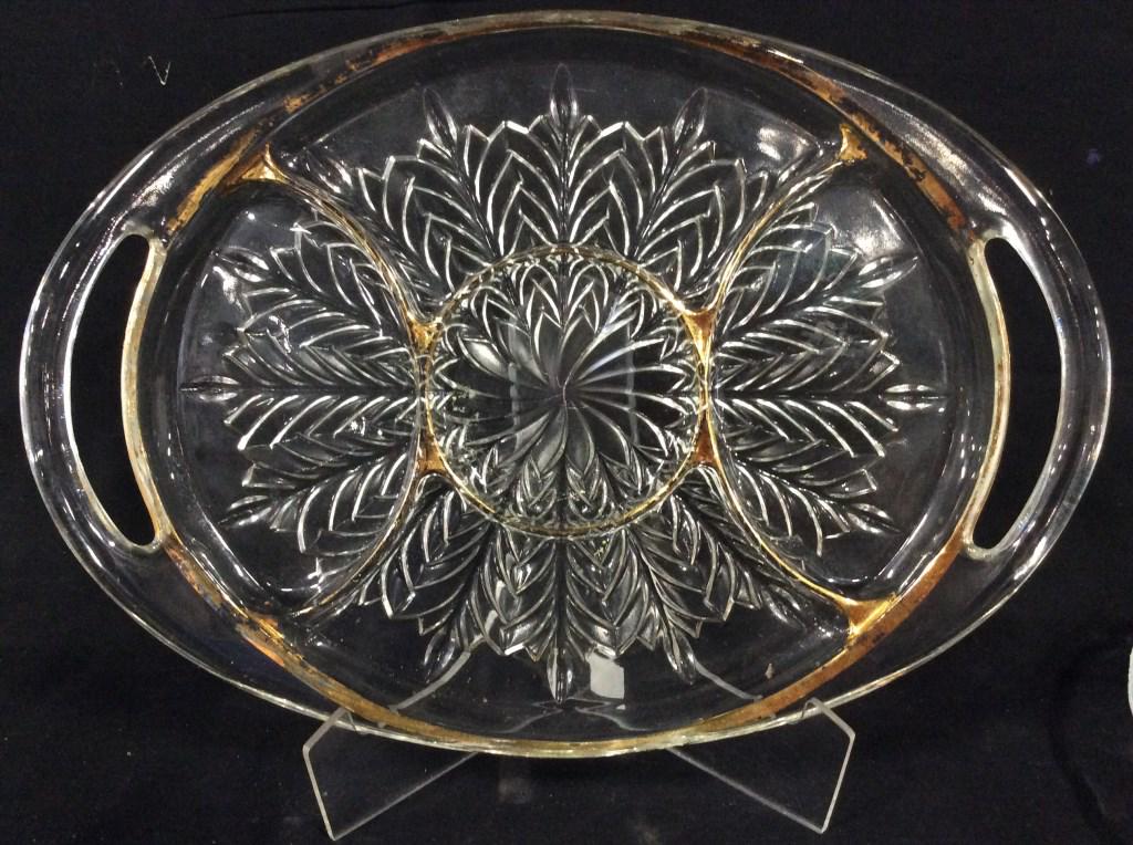 Lot 6 Vintage Tiffany Crystal & Glass Tableware: Two glass water pitchers, one on pedestal. Larger one appears to hold 2 quarts, 8.5 in tall, 7.5 in wide. 3 serving platters, 1 of crystal, not marked but it’s Tiffany & Co. Largest size 13 in. Oval