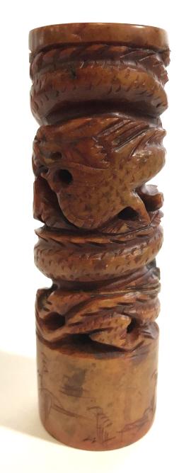 Petrified Wood Asian Stamp Totem: Totem appears to be petrified wooden. Contains intricately carved dragon detail. Asian character stamp. Piece measures approx 4.75 inches tall 1.5 inches wide. Includes red and gold toned box. asian a