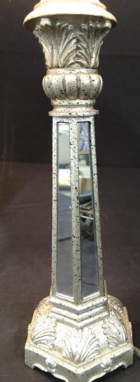 Pair Venetian Mirror Table Lamps: Embossed spotted silver tone composite with mirrored column pedestals in panels. Neoclassic decor, including Finials. Square silk lamp shades in cream. 23 in ht. Shade width, 9x 9 in. One shade has in