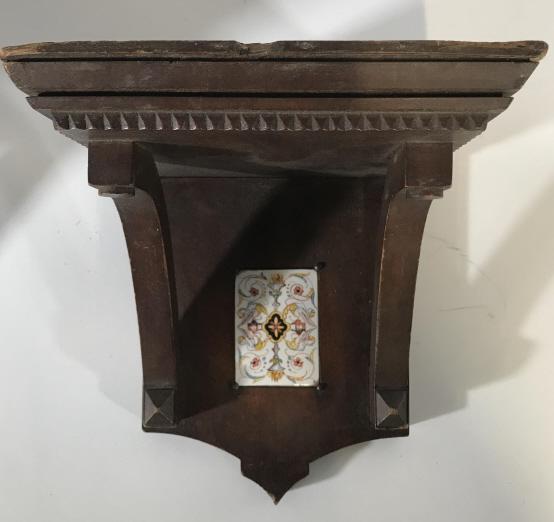 Pair Vintage English Walnut & Tile Shelves: Lot includes 2 shelves. Each appear to be Walnut. Both Have tile structures near center. Each have carved Detail. Pieces each Measure approx 9 inches tall 7 inches deep, 7.5 inches wide. Pieces have s