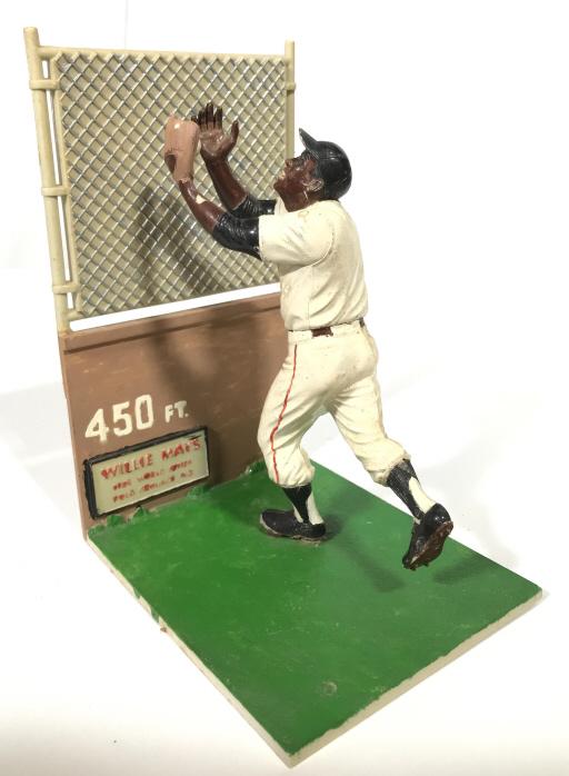 Vintage Willie Mays 1954 World Series Catch Figure: This is a figure depicting the famous catch made by Willie Mays during the 1954 World Series. The piece measures approx 8.25 inches H and 6 inches W. There is wear present on the piece due to the age 