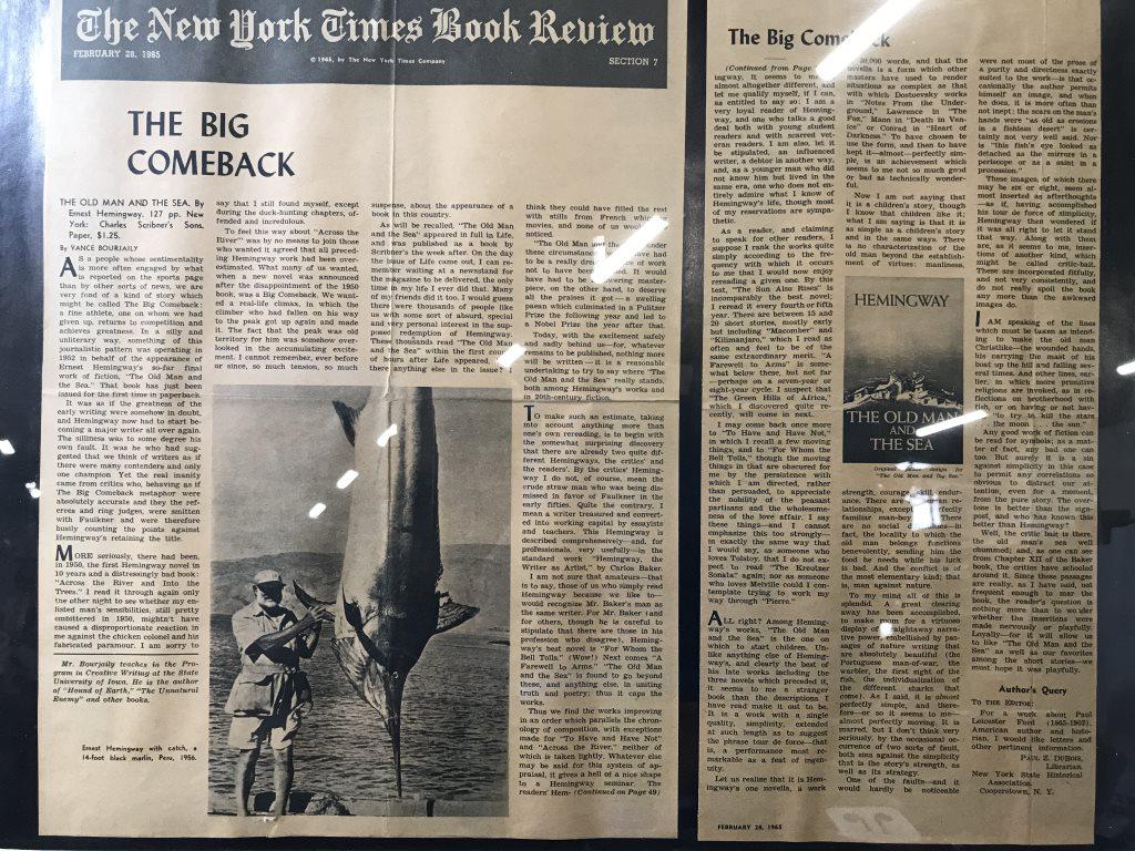 NEW YORK TIMES Framed Newspaper Clipping: Title of newspaper clipping read THE BIG COMEBACK. Piece makes mentions of ERNEST HEMINGWAY THE OLD MAN AND THE SEA. Piece is professionally framed and matted with black toned frame and white toned ma
