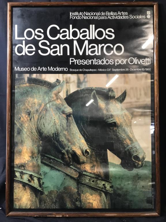 LOS CABALLOS DE SAN MARCO Framed Poster Print: Poster depicts image of horse statues. Piece reads LOS CABALLOS DE SAN MARCO. PIECE Is professionally framed with brown toned thin wooden frame . Piece measures approximately 28 inches tall 20 inches 