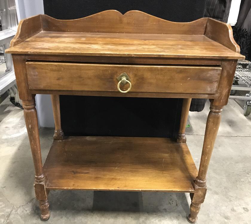 Vintage Carved Wooden Console W drawer: Table is wooden. Piece appears to possibly have hand crafted detail. Piece has 1 drawer with gold toned handle & hand dovetailing. Piece measures approximately 32 inches long 29 inches tall 17 inches 