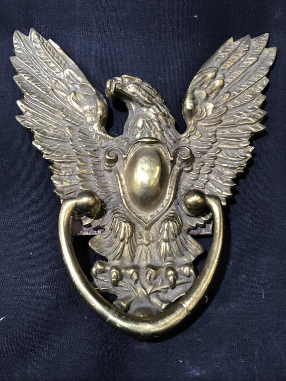 Gold Toned Brass Eagle Door Knocker: Door Knocker is gold toned and brass. Piece is shaped like an Eagle. Piece measures approximately 9.5 inches tall 8.5 inches wide. Door knocker, brass door knocker, Eagle Door Knocker, Vintage Door Kn