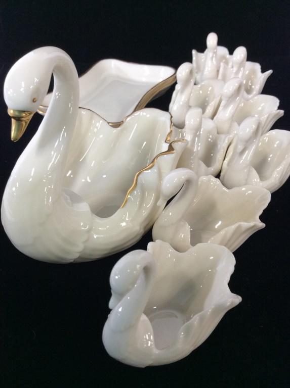 Set 11 LENOX Swan Decor & Trinket Dishes: 5 x 2.5 x 4 in. Lenox Swan Bowl accompanied by 8 Swan Figurines and corresponding flat trinket trays. Use baby swans as a place card holder for a formal dinner, the large swan as a candy/ mint dish, T