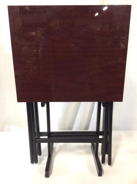 Lot 3 Tv Tables with Stand: Lot includes 2 TV Tables and 1 table stand. Tables and rack appear to possibly be wooden. Tables measures approx 26 inches tall 19 inches long 16 inches deep. When set up. Tv tables, television tables