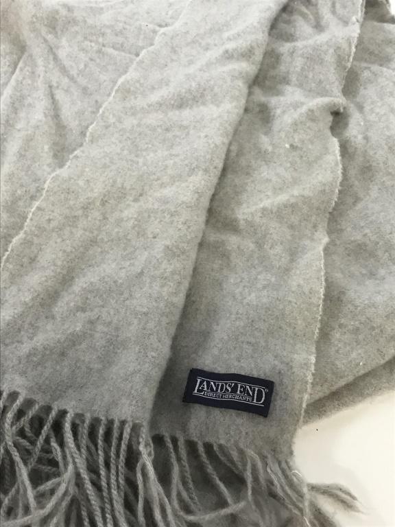 Land’s End Grey Cashmere Shawl, Scarf: 27 x 73 in. Very soft and warm. Land’s End Label attached. End have 3 in tassels. Neutral light grey. No woven issues noted, some small punctures near length edge- see pictures. Cashmere, Cashmere S