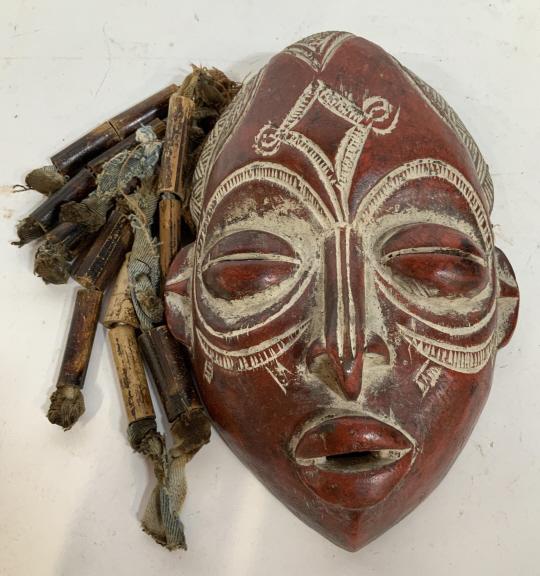 Carved Tribal Mask Sculpture: Mask has burlap weave and wood beads as hair, mixed media, measures app 14 inches hit, width app 13 inches with beaded hair, depth 4 inches, tribal art, african art, African crafts, decorative arts an