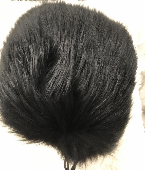 NATIONAL Fox Fur Hand Muff/ Bag: Animal Fur, Possibly dyed Fox, traditional hand muff and secret purse. Also has twisted cord carry handle. Interior has zipper to store light accessories. Zipper Slider marked ‘NATIONAL’. Interior