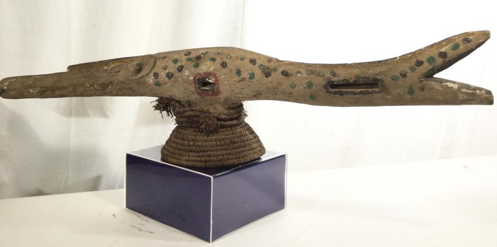 African Art Ijoh Fish Wood Sculpture, Nigeria: West African Fish Sculpture, Ijoh Tribal Art On Woven wicker stand, lightly decorated with green and black painted dot design. 44 in. long, app 10 in ht. Surface wear consultant with age. Tribal Ijoh 