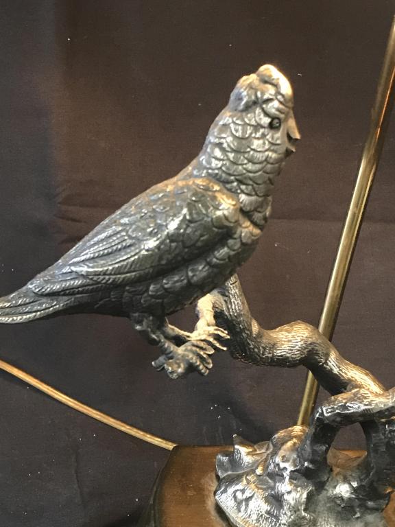 Vintage 3 Way Brass Lamp w/ Cockatiel Sculpture: Multi Tier Brass Stand, attached is a silver tone sculpture of 2 cockatiels sitting on branches. Sculpture is prominent on base, 11 in long, app 9 in tall, 6 in. wide. Lamp socket sits on a pole ( pol