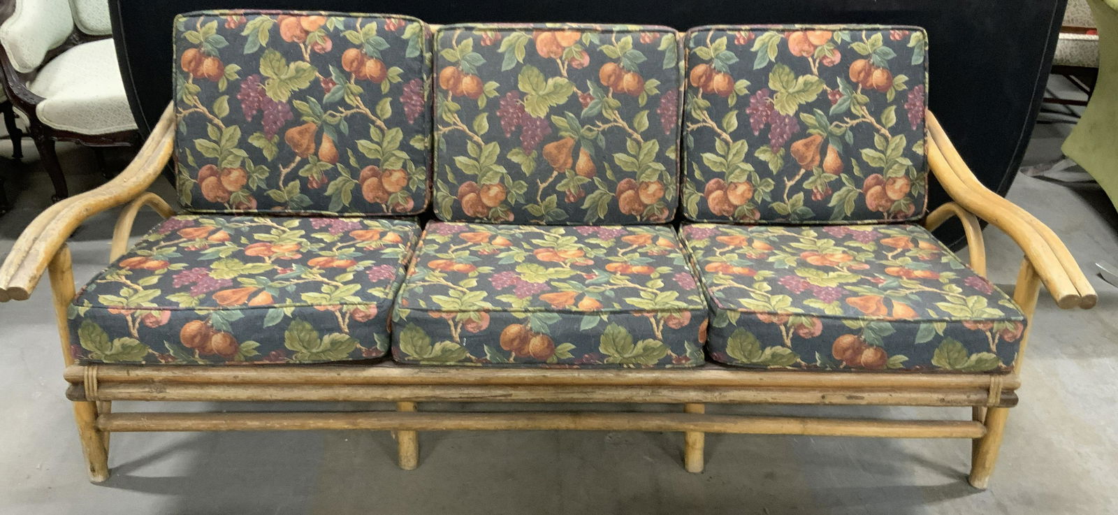 Vintage Outdoor Wood & Leather Sofa: This is a pair vintage outdoor sofa, the piece is crafted from wood, the seat is leather. The sofa includes several removable cushions for both the back and the seat of the piece. The cushions feature