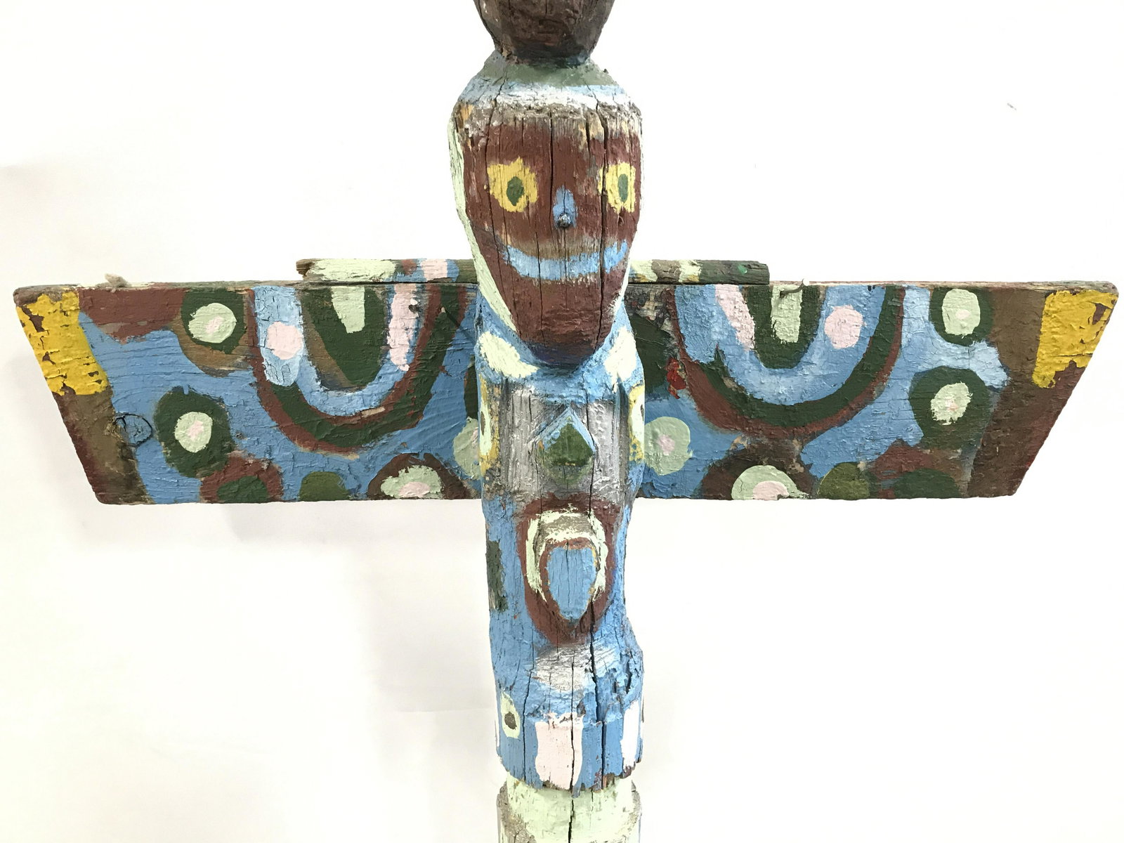 Carved Wooden Hand Painted Totem Pole, life sized: life sized Totem pole is wooden. Piece is possibly hand carved. Totem pole is hand painted. Piece measures approximately 64 inches tall 38 inches wide 16 inches deep. Totem pole, wooden totem pole, ha