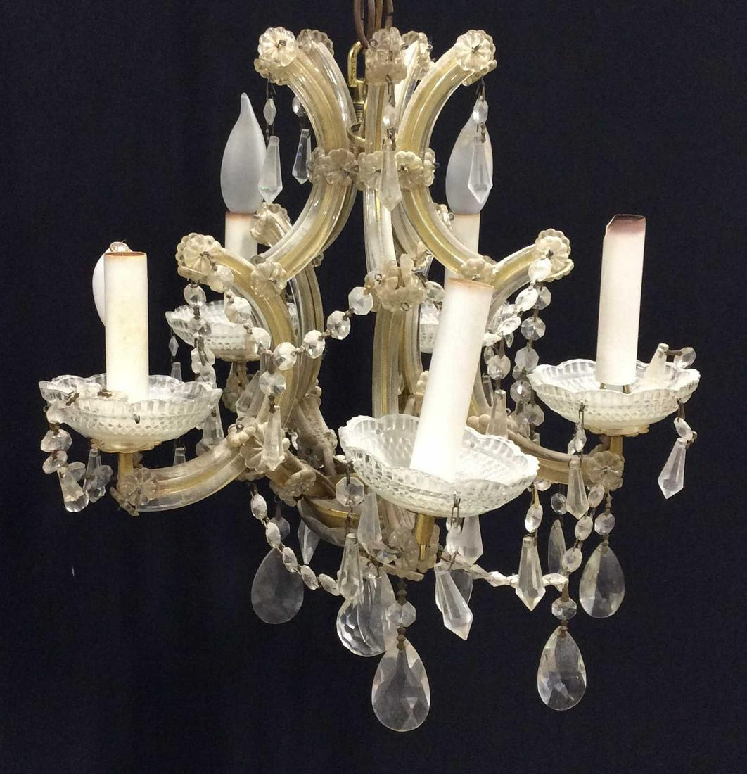 Retro Glass Rosette & Crystal 5 Arm Chandelier: Retro 1940’s , 1950’s Glass Chandelier, 16 in wide. 17 in. long from top of Chandelier to bottom center ball crystal. Tear drop dangle and florets (composite). Ceiling chain approx 22 in long. May