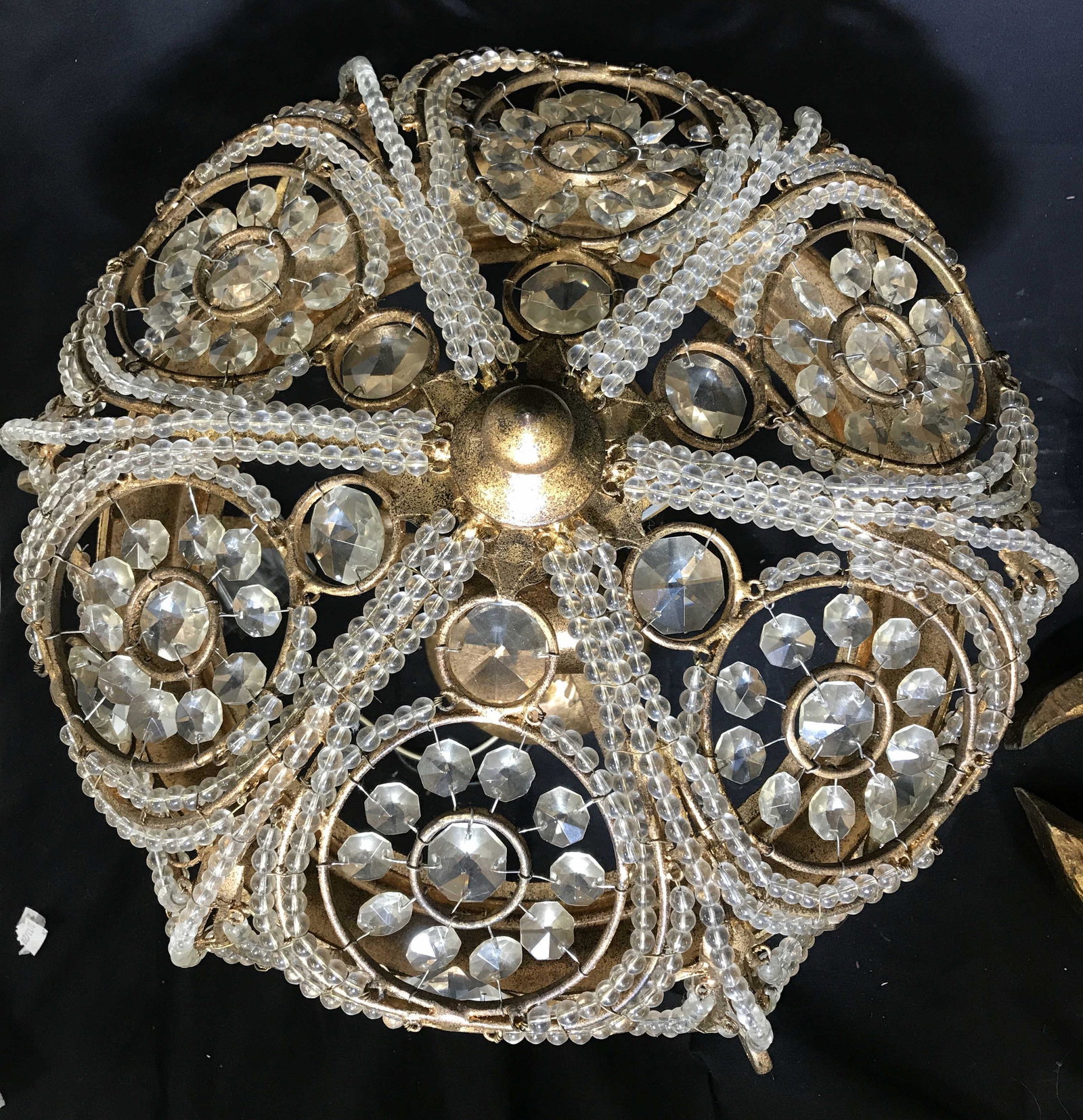Quoizel Inc. Rococo Italian Style Ceiling Light: 3 lights. Antiqued Gold- Bronze patina On Metal embellished with clear plastic beads embellishing scroll and circular design. Neo -Classic ceiling pole and leaf rim, embossed leaf ceiling plate. App 1