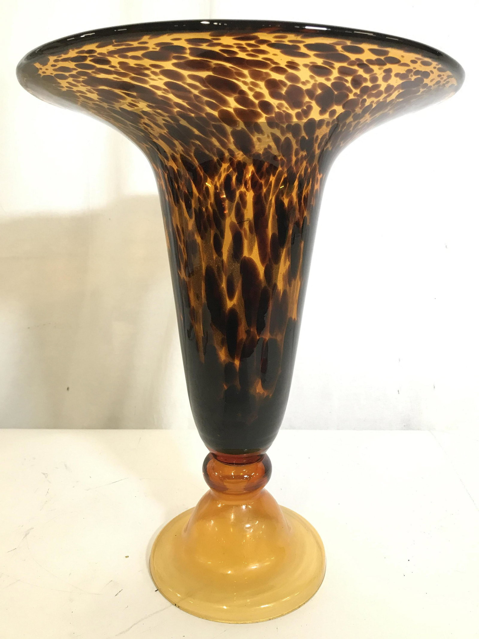 Amber Toned Pedestal Art Glass Vase: Vase has amber and brown tones. Piece is Pedestaled. Measures approximately 17 inches tall 13 inches wide. Vase, art glass vase, Pedestal vase. tableware tabletop decor, home accent centerpiece vase 6