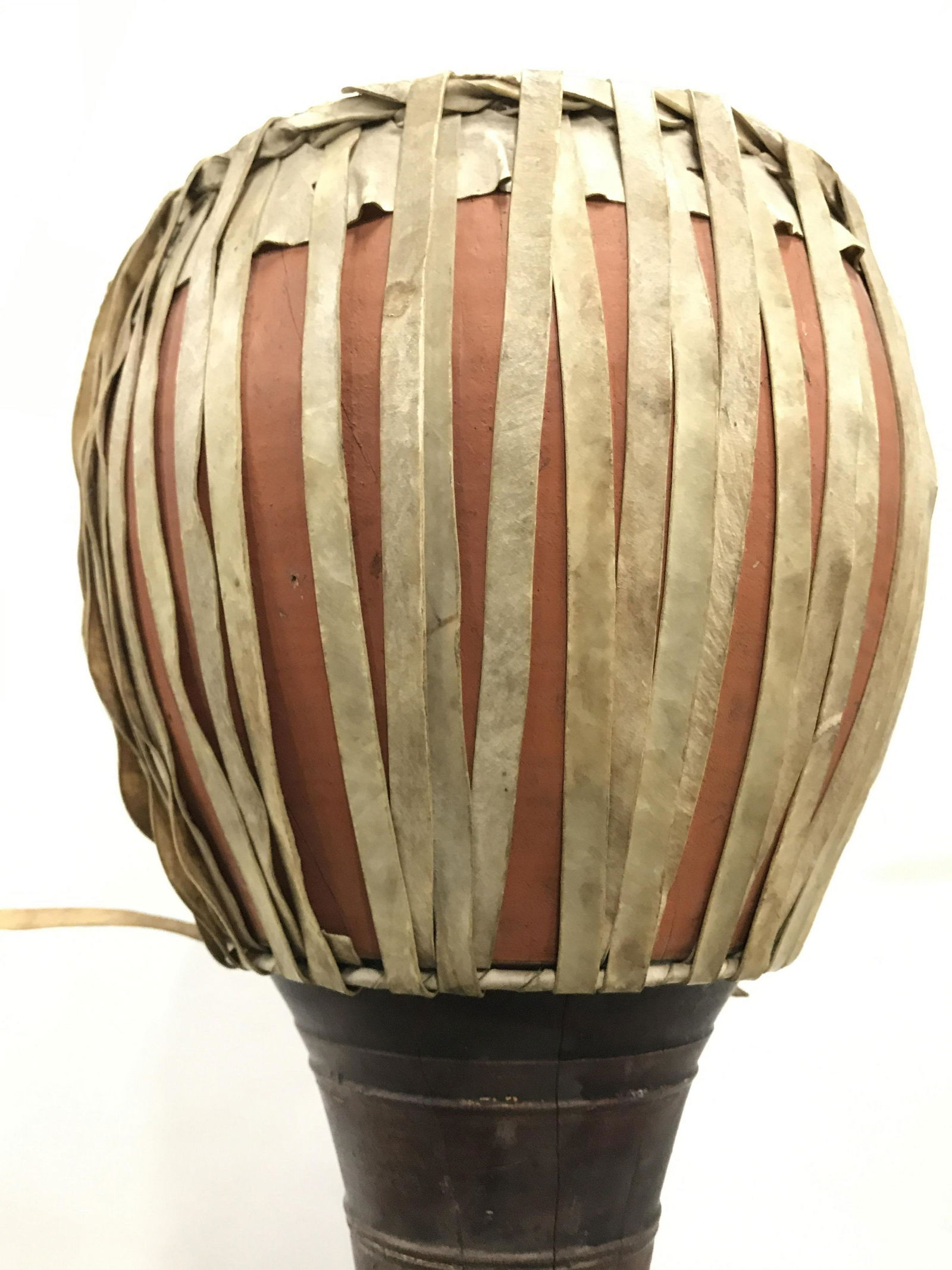 Vintage Tribal Pedestaled Drum: Drum is vintage possibly antique. Piece has Tribal stylings. Possibly African, Possibly Native American. Piece measures approximately 27 inches tall 10 inches wide. musical instrument Drum, tribal dru