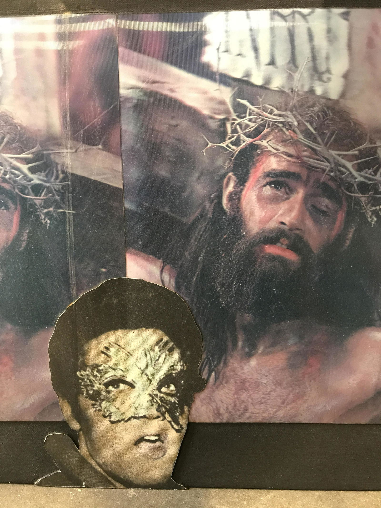 Elvis, Jesus Screen POP ArtPainted Canvas, David Davis: Mixed Media art on black painted canvas on stretcher, using 3D Screens of Â‘JesusÂ’ likeness from a movie or television show, alternating with Elvis PresleyÂ’s enlarged Face Cut- outs ( on th