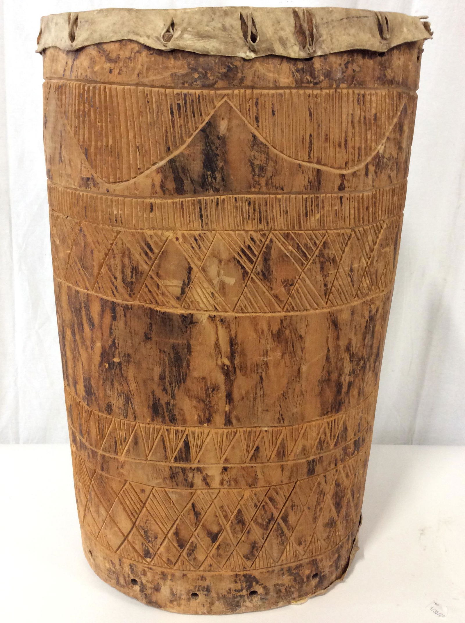 Vintage Carved Wooden Tribal Drum: Drum is vintage possibly antique. Piece has intricate hand carved detail. Piece measures approximately 22 inches tall 14 inches wide. Drum, Tribal drum, vintage drum, carved wooden drum. musical instr