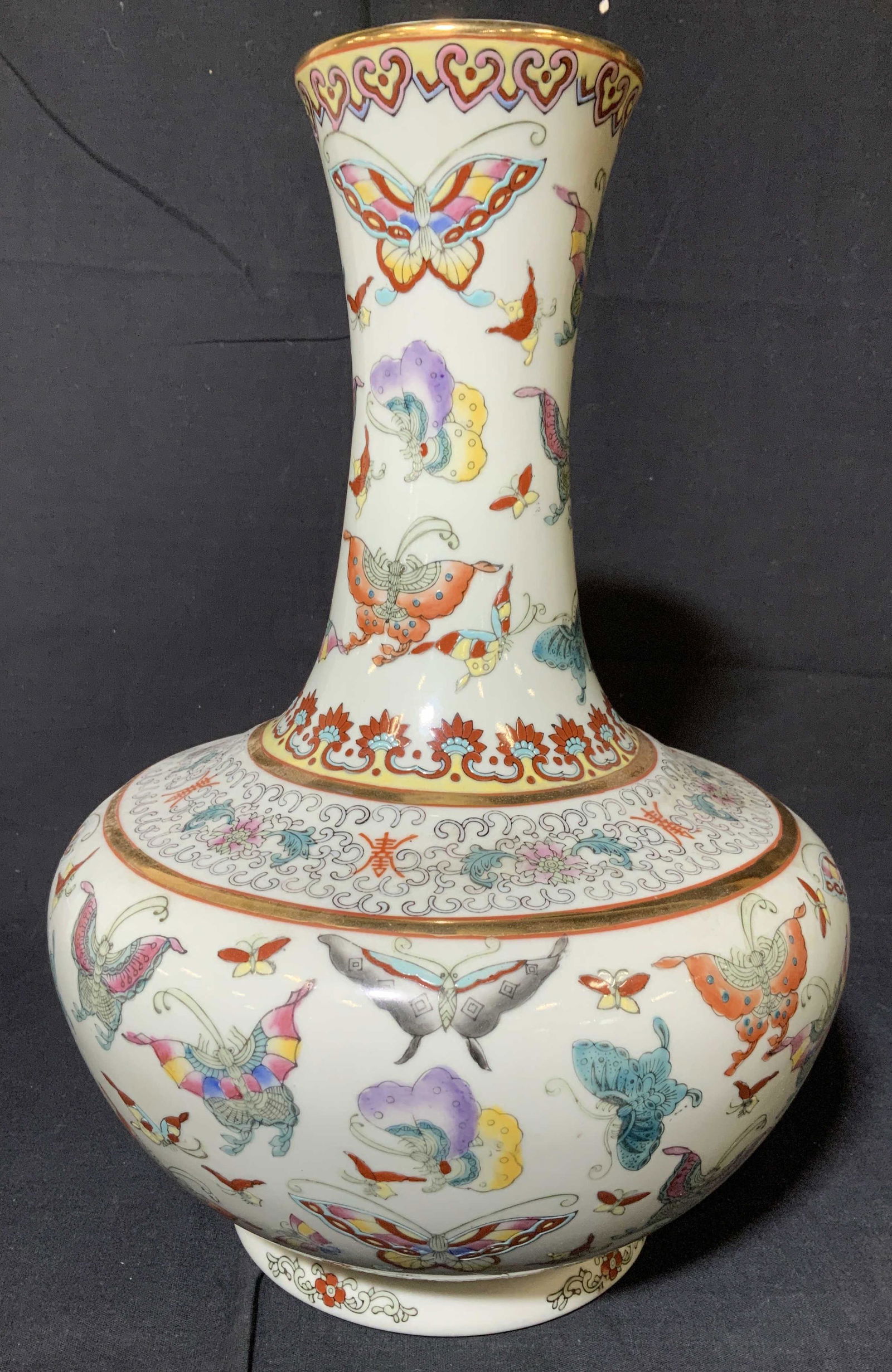 Signed Vintage Chinese Decorative Vase: This is a vintage, possibly antique, Chinese vase. The piece is hand painted, covered butterflies, reticulated florals and soft Leiwen patterns. Solid Gilt paint striped rim , center. The piece measur