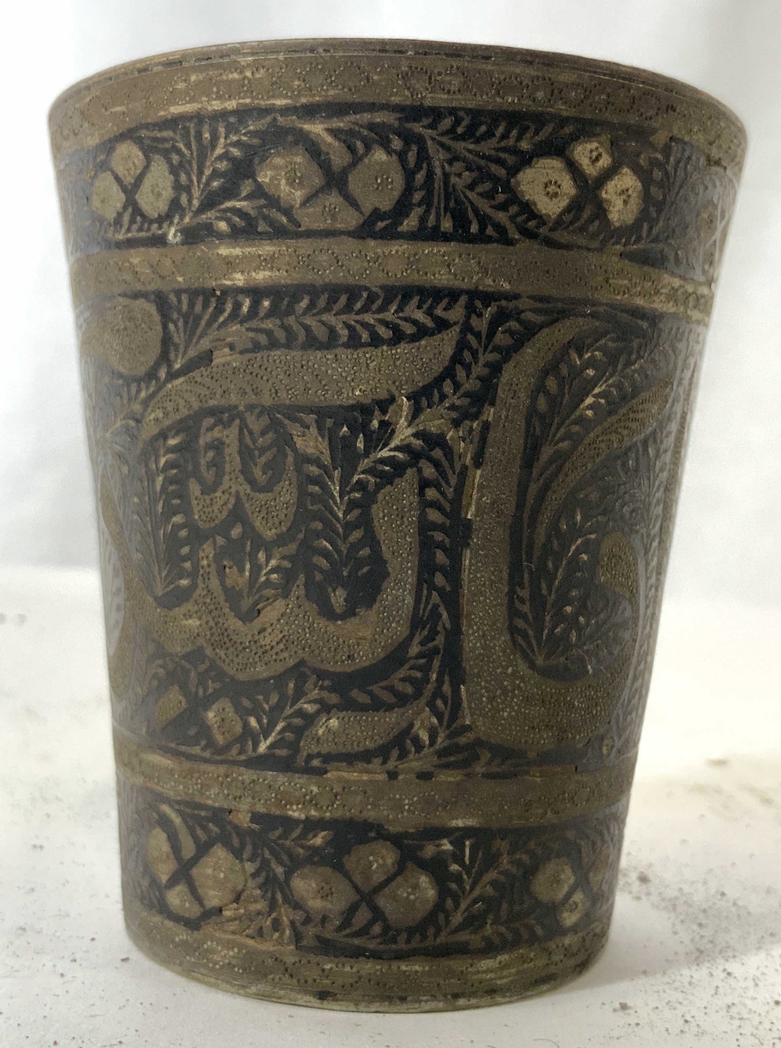 Antique Judaica Pewter Vessel: Vessel appears to have Hebrew characters. Piece is pewter. Appears to be hand painted. Vessel is antique. Antique vessel, antique Judaica, antique Hebraica, Judaica cup. Piece measures approximately 3