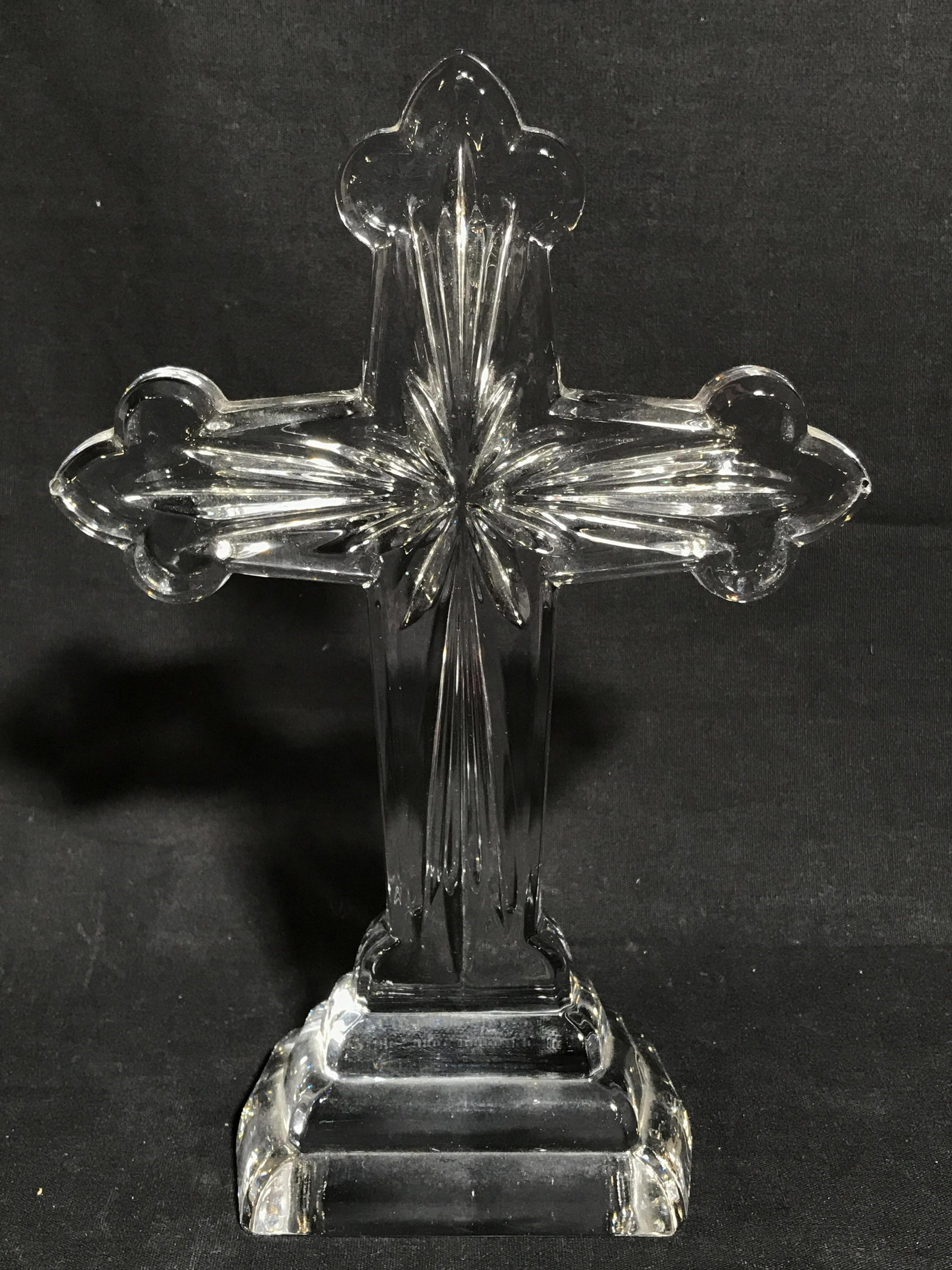 Standing Glass Tabletop Cross: Cross appears to be Glass Possibly Crystal. Cross stands on its own. Piece measures approximately 10 inches tall 7 inches wide 3 inches deep. Standing cross, glass cross, tabletop cross, religious tab