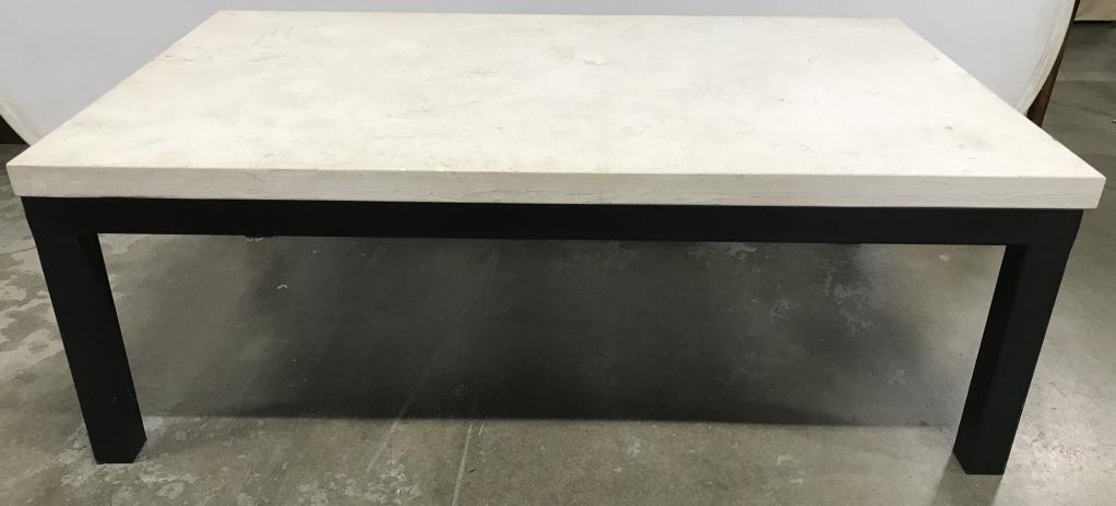 Modern Metal Coffee Table W White Tnd Stone Top: Modern black tone metal coffee table with white/cream tone stone top. Table has substantial weight. Measures approx 17.5 inches in height by 28 inches by 48 inches in length and width. Stone tabletop
