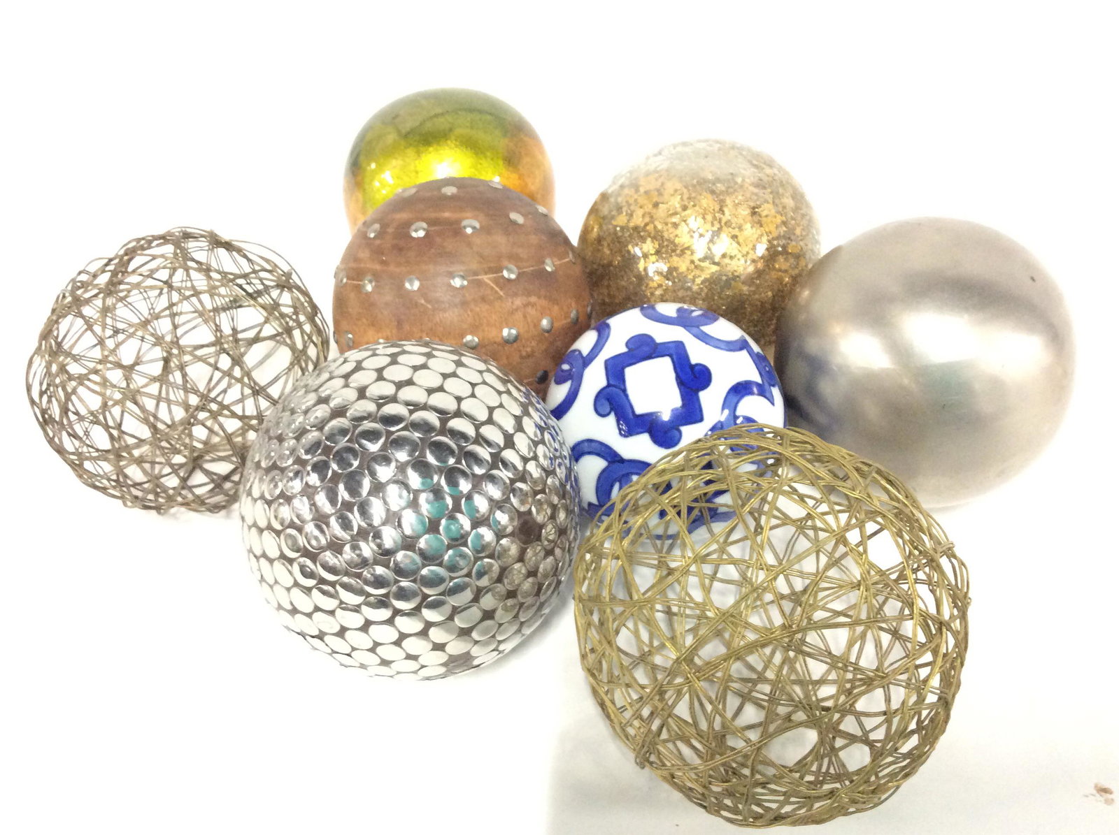 Lot 8 Decor Table Spheres, Mixed Materials: Average size is 4 x 4 rounds. Combination of Art glass, pierced wire, wood, metal, composite that resembles porcelain. String lights through them, add to a basket for a decorative table centerpiece. D
