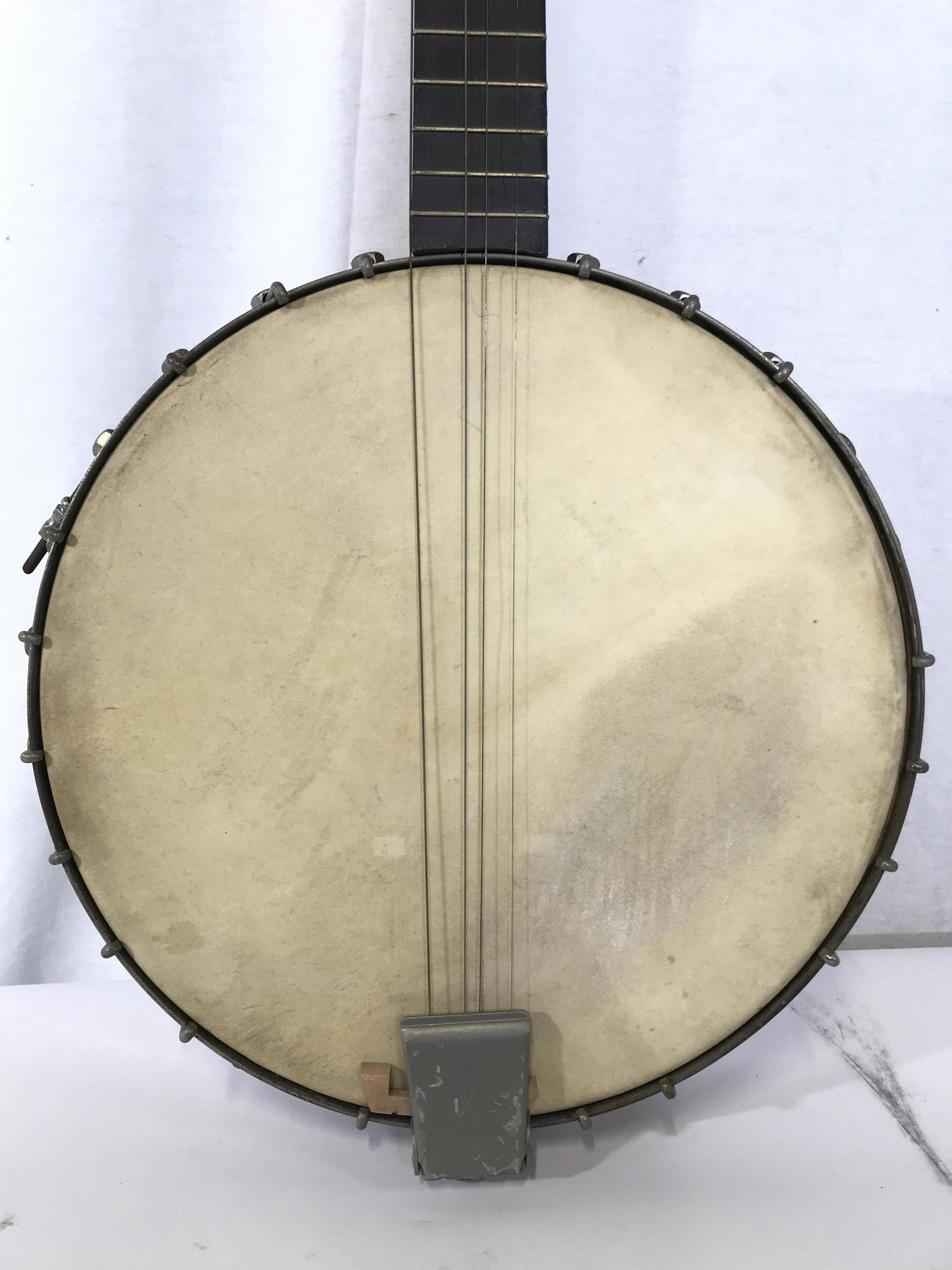Vintage Banjo Instrument: Banjo is vintage. Piece has 4 strings. Piece measures approximately 30 inches long 12 inches wide. Banjo, vintage banjo, stringed Instrument, musical instrument, vintage stringed Instrument. Piece may
