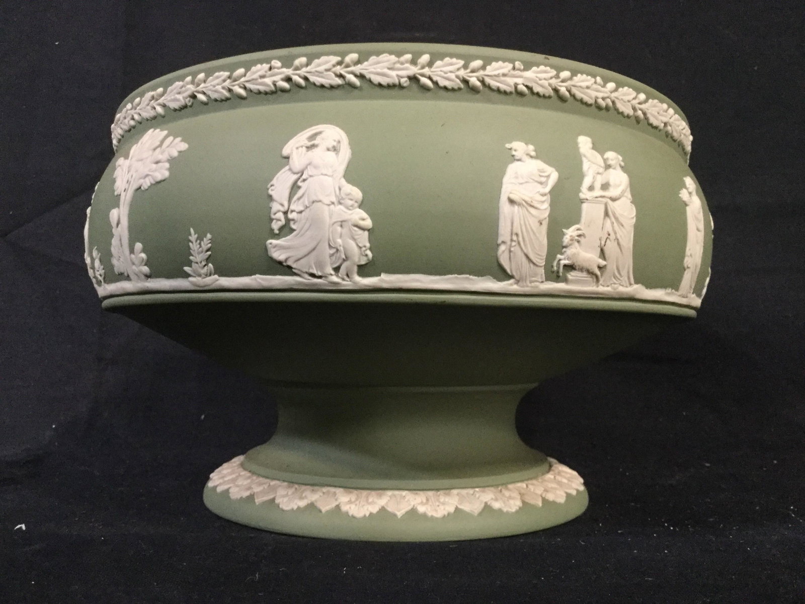 WEDGWOOD Green Jasperware Bowl: Pedestal bowl, Green Jasperware with Relief figures in white tones, Greco-Roman figures in robes, Neo classical design, measures approx 5 in by 8 in in diameter. some minor surface wear, Low Tazza Bow