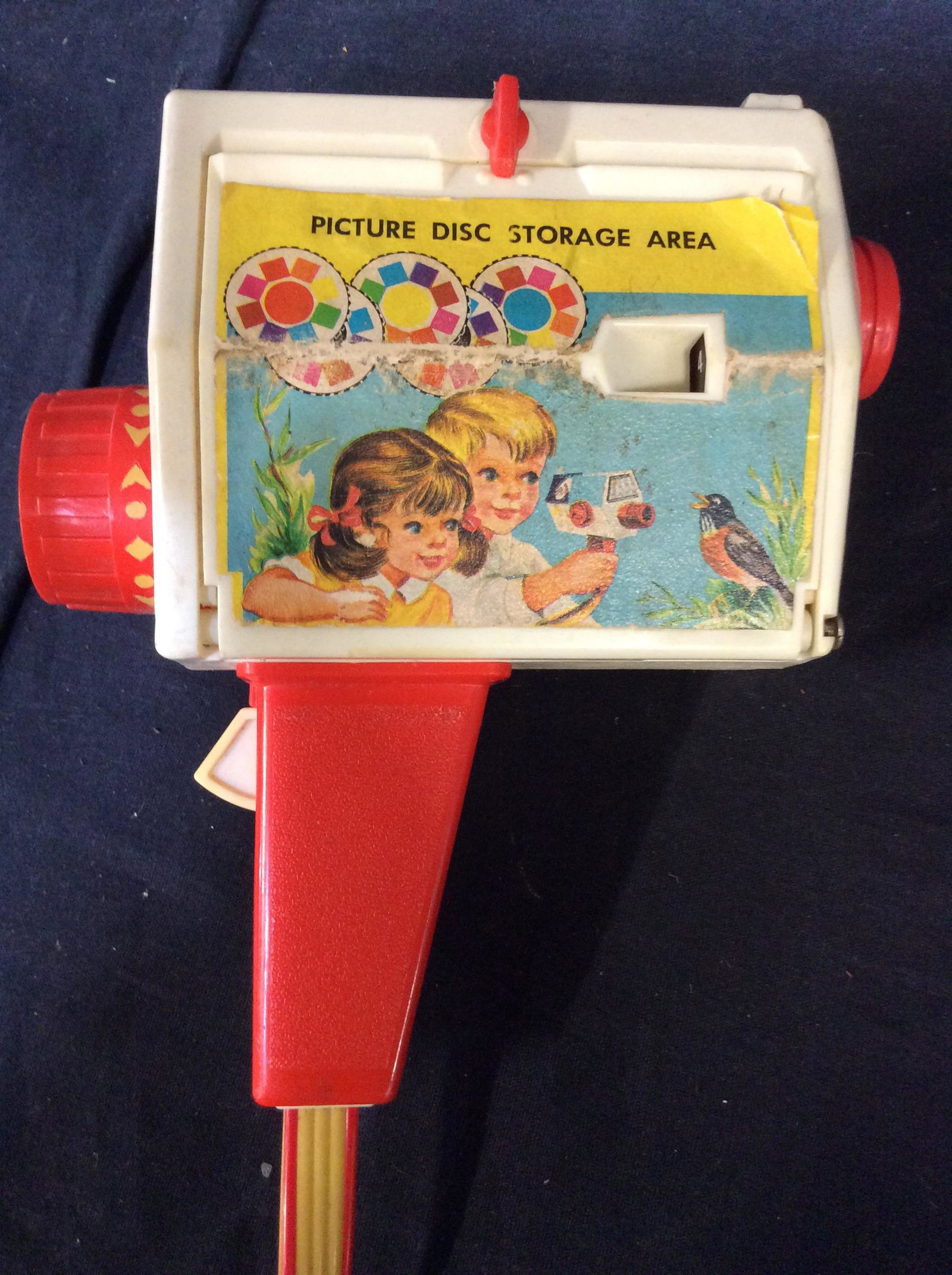Vintage Fischer Price Music Box Movie Camera: with 5 picture discs. Music Box Movie Camera Picture Story Viewer, some wear, measures approx 7 8n by 4 in by 6 in, collectible toy, vintage, retro toy, 4