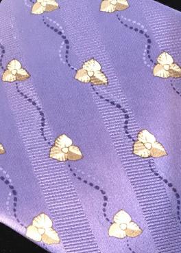 VALENTINO Cravatte Italian Silk Dress Tie, Italy: Incredibly luxurious, soft and supple Valentino Men’s Tie, Dis. N. 69123. Violet Blue with grey florals and wavy design lines. Widest width 3 3/4 in. Length 57 in. Hand Made in Italy. 100% Silk. Sec
