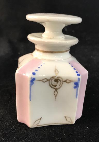 Porcelain Bottle, Vanity Accessory: white toned porcelain, pink and blue details, gilt trim, some surface wear to paint, 3 1/2 in by 2 /14 in by 2 1/4 in. tableware, bottle, snuff bottle, tableware 4