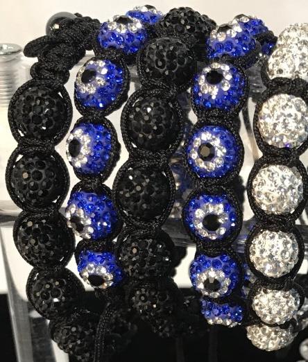 Lot 9 Rhinestone and beaded Jewelry: Matching pairs of 3 in diameter Black rhinestone cluster beads & Cord Bracelets. Blue, White & Black rhinestones, 3 piece matching Set Pr. Stud Earrings, Ball Bracelet, And Cross Pendant Necklace. Ear