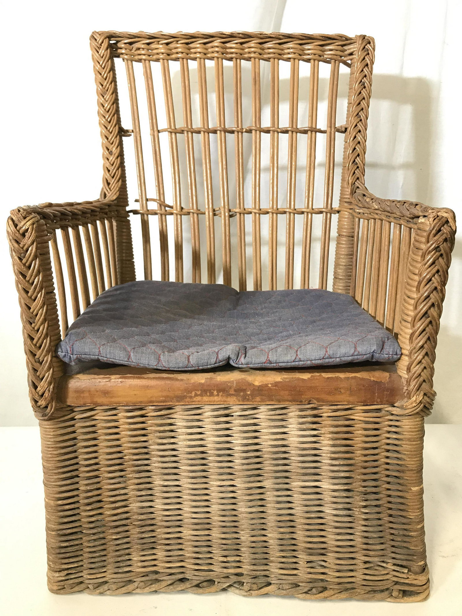 Vintage Outdoor Children’s Woven Wicker Armchair: Armchair is woven wicker & petite in size. Piece measures approximately 23 inches tall 14 inches wide 13 inches deep. Children’s chair, children’s arm chair, wicker armchair, small wicker chair, p