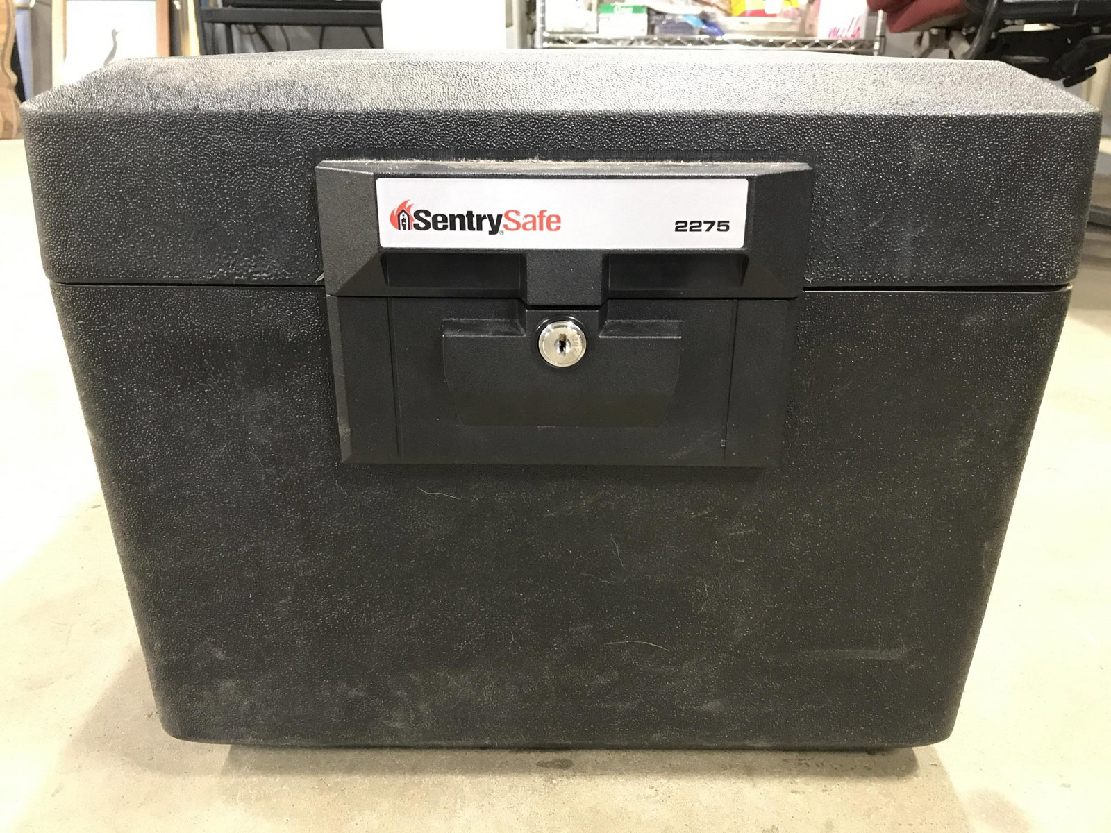 Black Toned SENTRY SAFE: Tag on front of piece reads SENTRY SAFE 2275. PIECE is black toned. Possibly vintage. Piece measures approximately 14 inches tall 17 inches wide & deep. Safe, sentry safe, black safe, lockable safe. 6