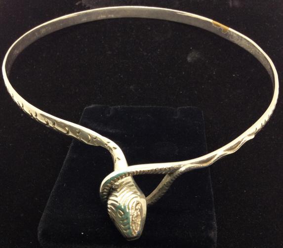 Embossed Serpent Collar Necklace, Vintage: App 15 in. length, serpent head hooks into looped tail. Silver tone over brass base, head measures app 1 x .5 in. Collar width 1/4 in. Serpent collar, Serpent Choker, Jewelry, Snake Design, Silver Ton