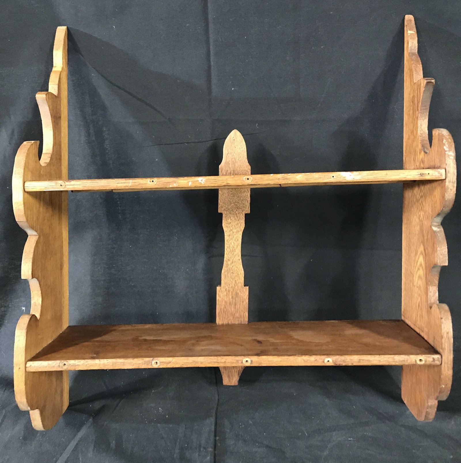 Vintage Carved Wooden 2 Tier Wall Mount Shelf: Shelf is wooden. Piece is possibly hand carved. Piece contains 2 shelves. Piece measures approximately 19 inches long 22 inches tall 6 inches deep. Shelf, Wall Mount shelf, wooden shelf. decorative ac