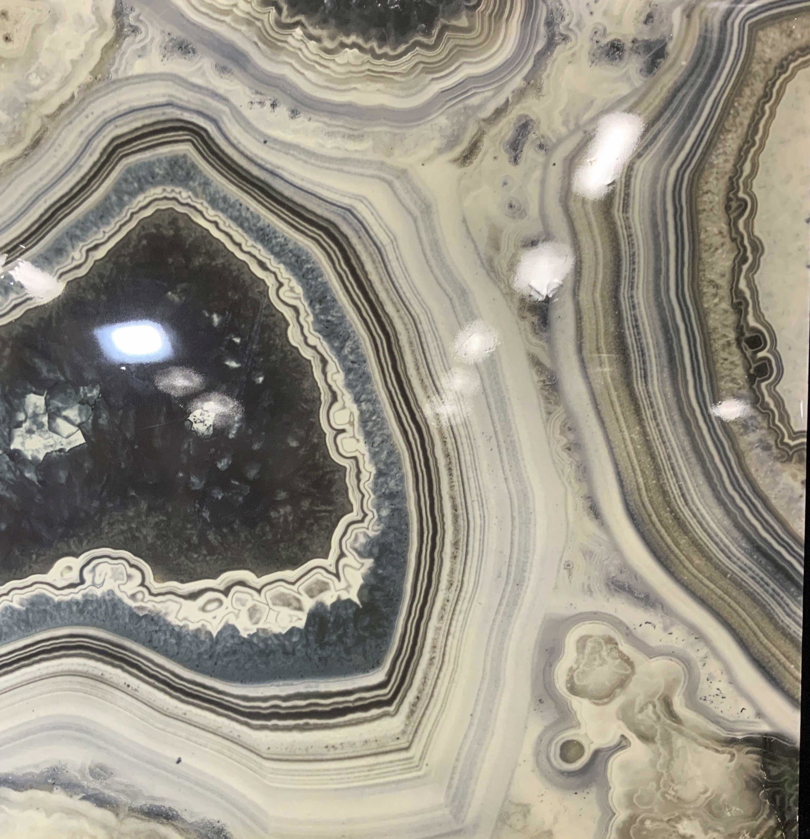 Digital High Gloss Print of Geode: Oversized Geode High Gloss Print, geode in grey and blue, canvas stretched over wooden frame, possibly canvas, canvas edges exposed on reverse, some wear to sides of canvas, scuffs and dents on print,