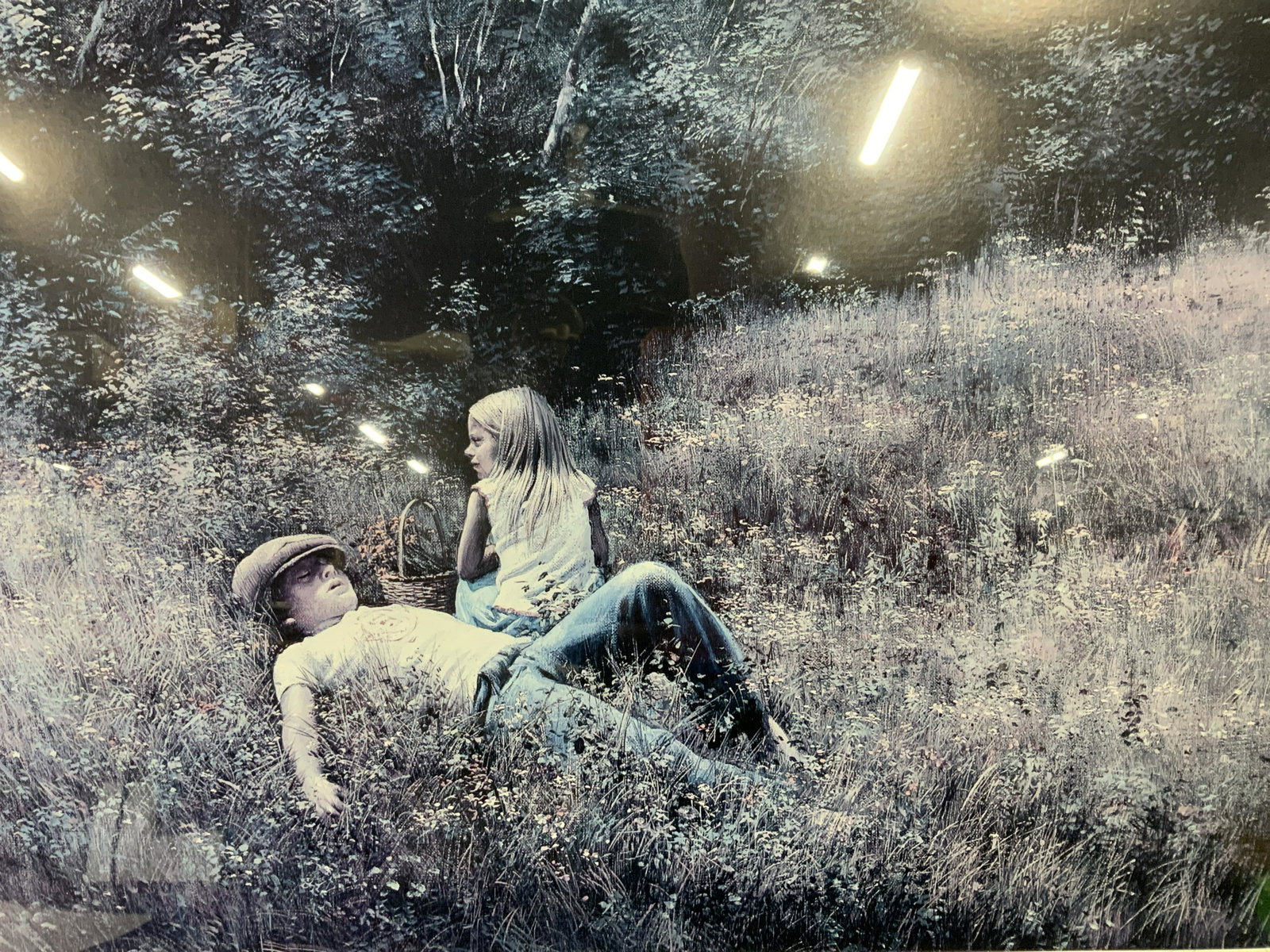Signed Limited Edition Art Print, Adolf Sehring: Signed limited edition offset lithograph of two children in a field, blue greyscale palette, edition lower left corner in pencil 469/1000, signed lower right corner in pencil, double matted in blue an