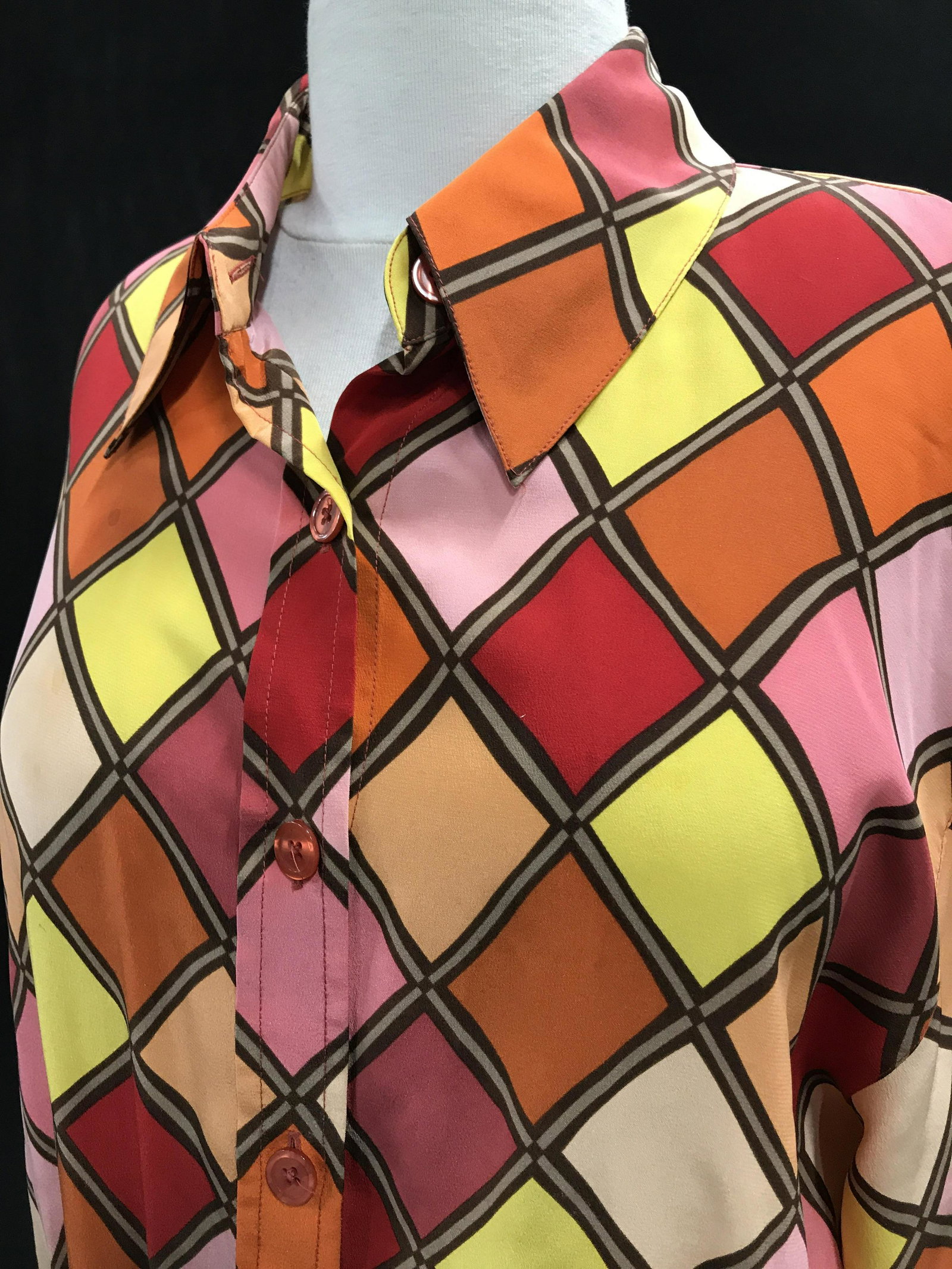 Vintage Diane Von Furstenberg Silk Blouse, Med.: Silk Button Down Blouse, c. Late 70s, designer label affixed with care instructions, 100% silk, made in China. Buttoned cuffs, multi colored diamond design in yellow, orange, red & beige. A light blem