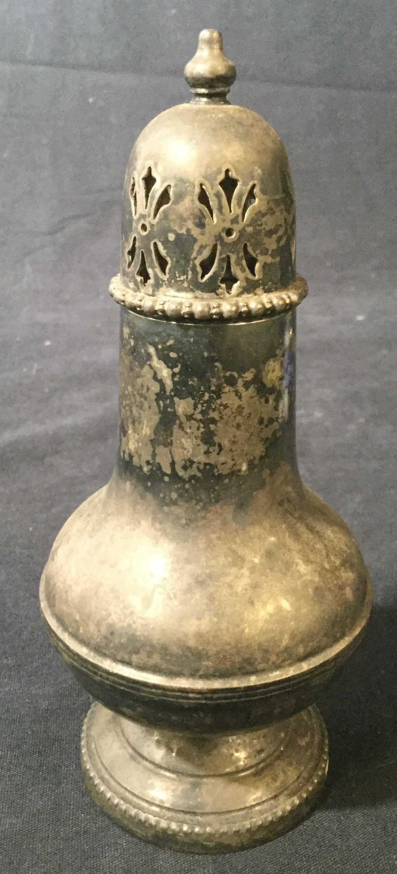 Vintage Silver Plate Shaker, England: This is a silverplated seasoning shaker, the piece is vintage, possibly antique. The underside of the piece SILVER PLATED, MADE IN ENGLAND. The shaker measures approx 6.75 inches H and 3 inches W. The