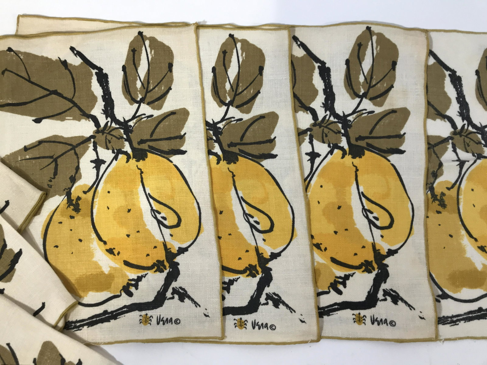 Set 8 Vintage VERA Linen Napkins And Place Mats: Set 8 Vintage Vera Linen Cloth Napkins And Placemats cream toned background with earth toned fruit and branch design, marked in lower right corner of fabric Vera c with insect symbol, placemat measure