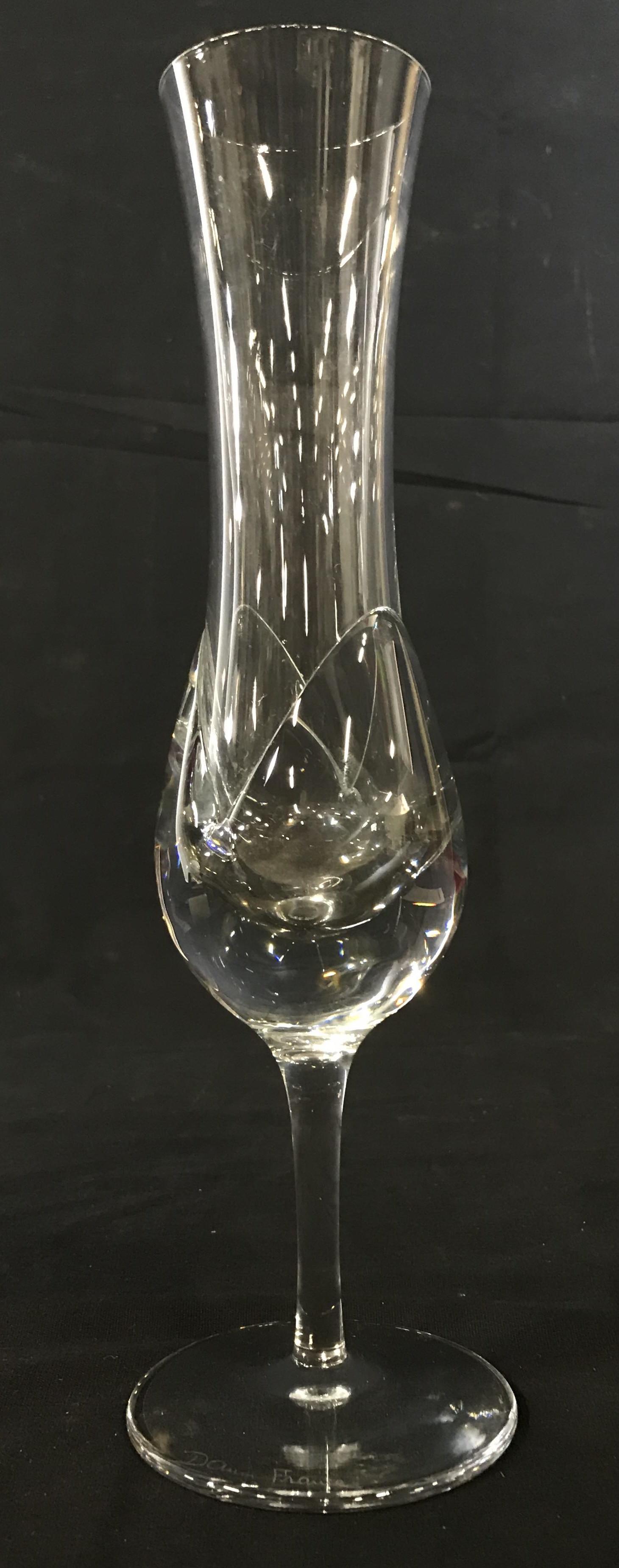 Signed DAUM France Crystal Glass Vase: Signed DAUM France Crystal Glass Vase with fluted top and delicate stem base, etched on lower disk DAUM France, measures approximately 11 inches tall x 3 1/8th inch diameter at base, no condition issu