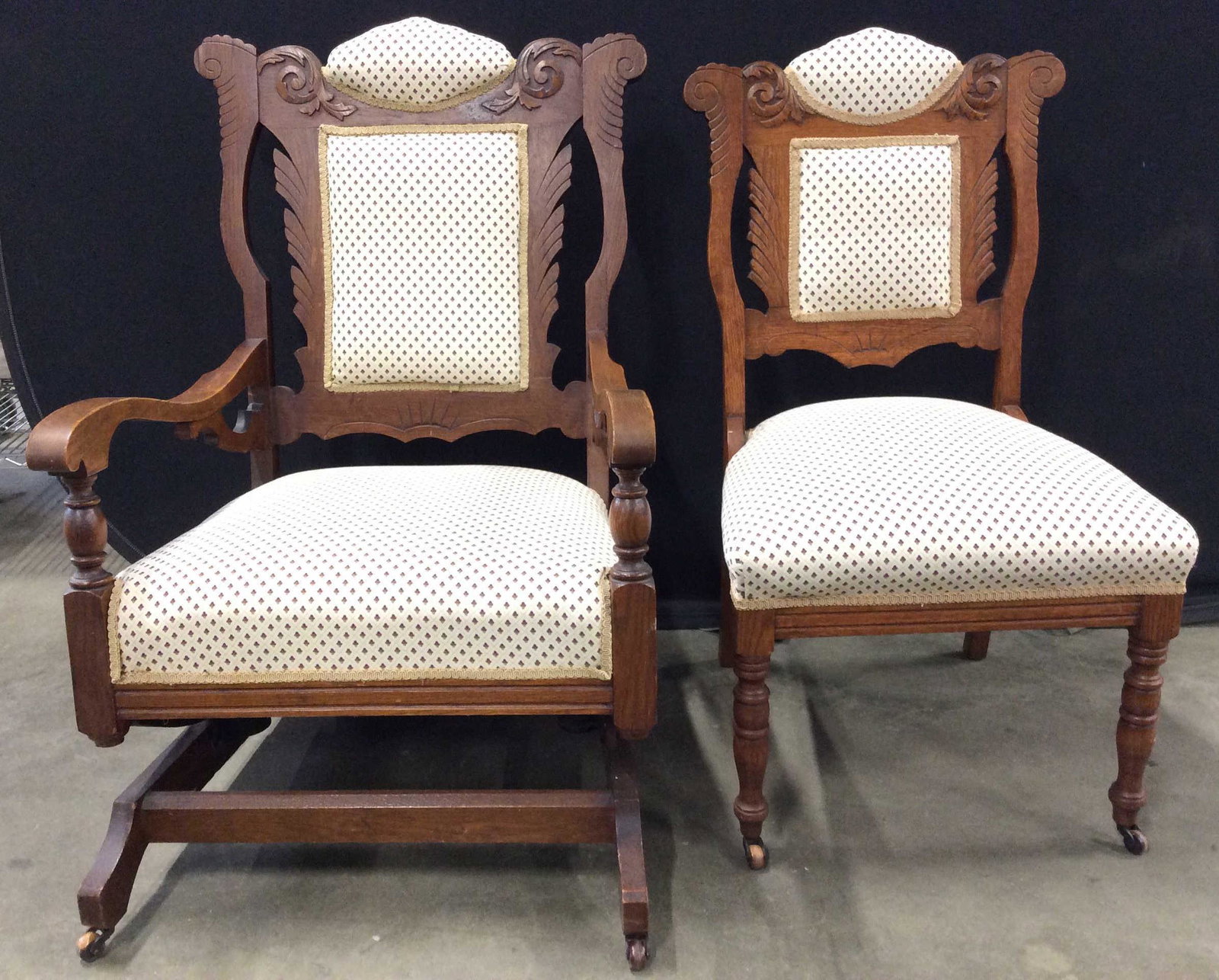 Lot 2 East Lake Vintage Matching Rocking & Side Chair: Lot includes 2 East Lake arts and crafts chairs. One rocking chair & one side chair. Each chair has 2 front Casters. Each chair has intricately carved wooden detail. Piece has gold toned detail at edg
