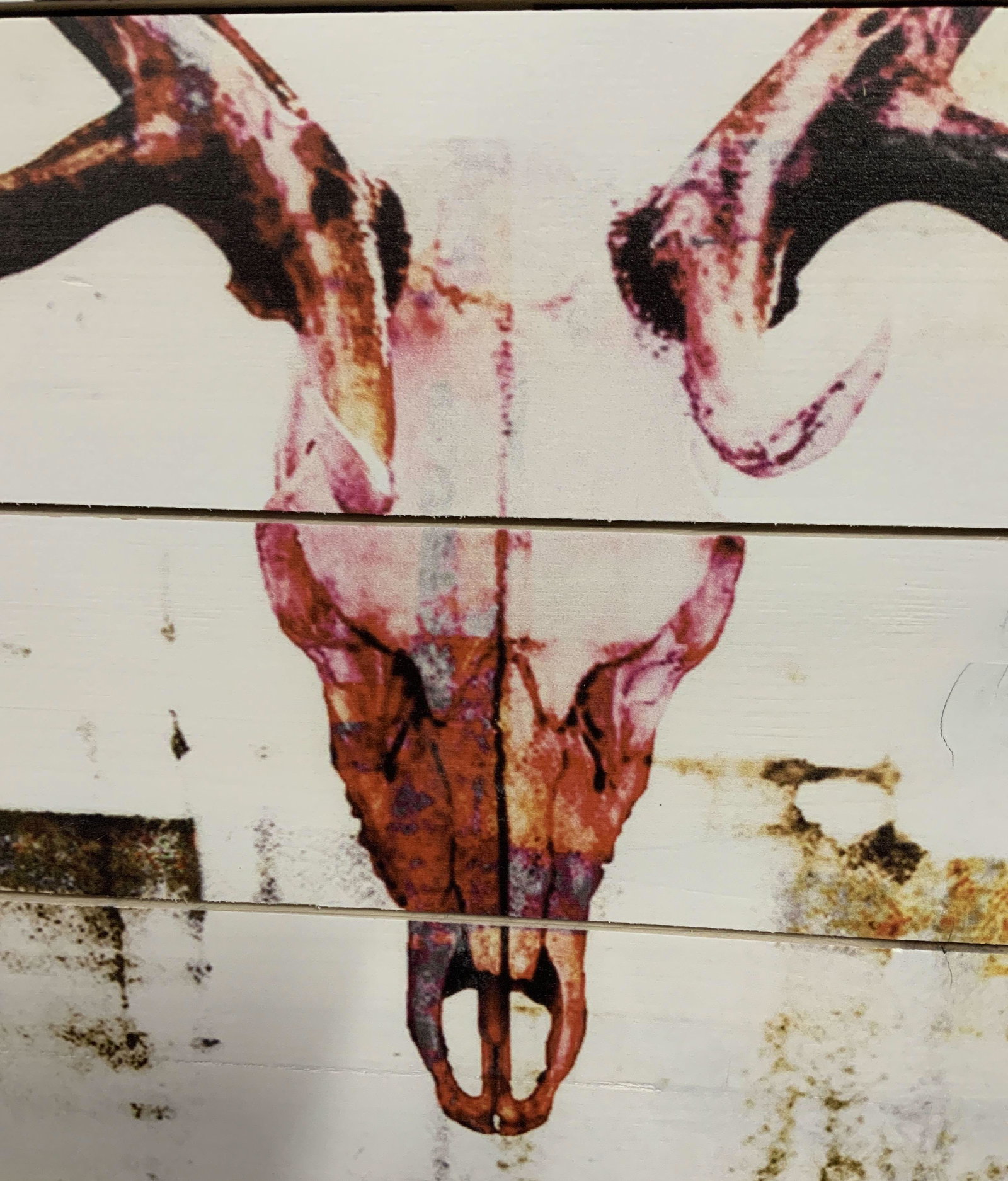 Print of Stag Skull on Wooden Palette: Print of Stag Skull on Wooden Palette, UV ink print, multimedia, white painted wood, mass produced art, signature printed in lower right corner of piece reads Parvez, subject pink neon stage skull wit