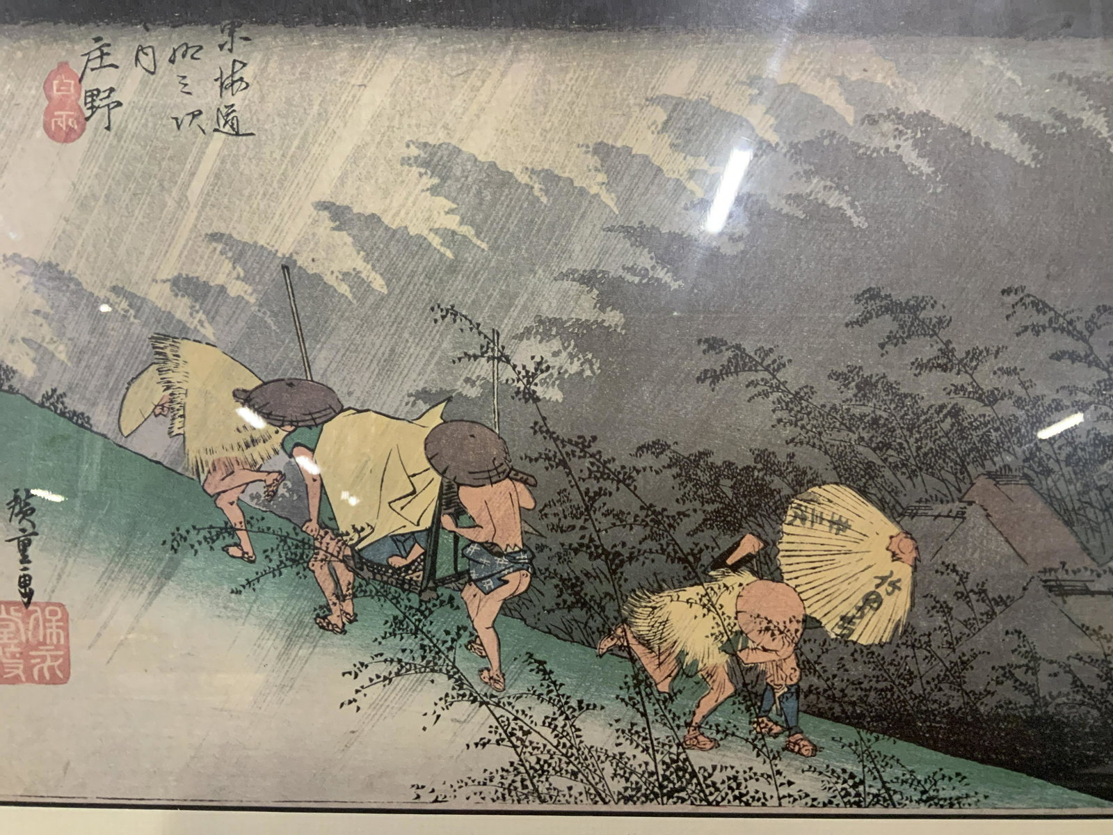 Print of Ukiyo-e By Ando Hiroshige: Print of Ukiyo-e by Ando Hiroshige, seal of Hiroshige on lower left corner, description of station upper left corner, beige matting black and green wooden frame, reverse sticker reads ‘Shono: one of